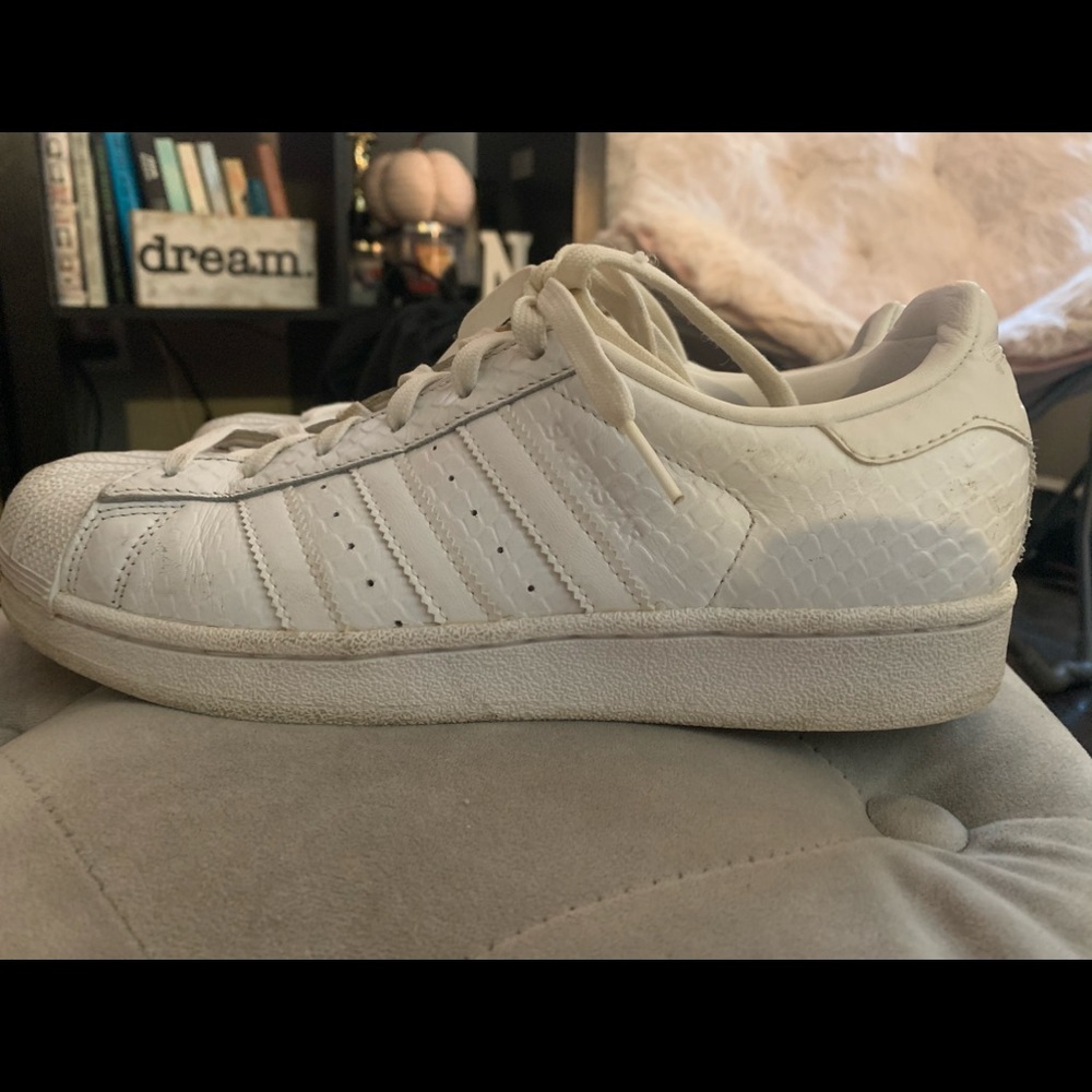 all white Adidas superstars-snakeskin